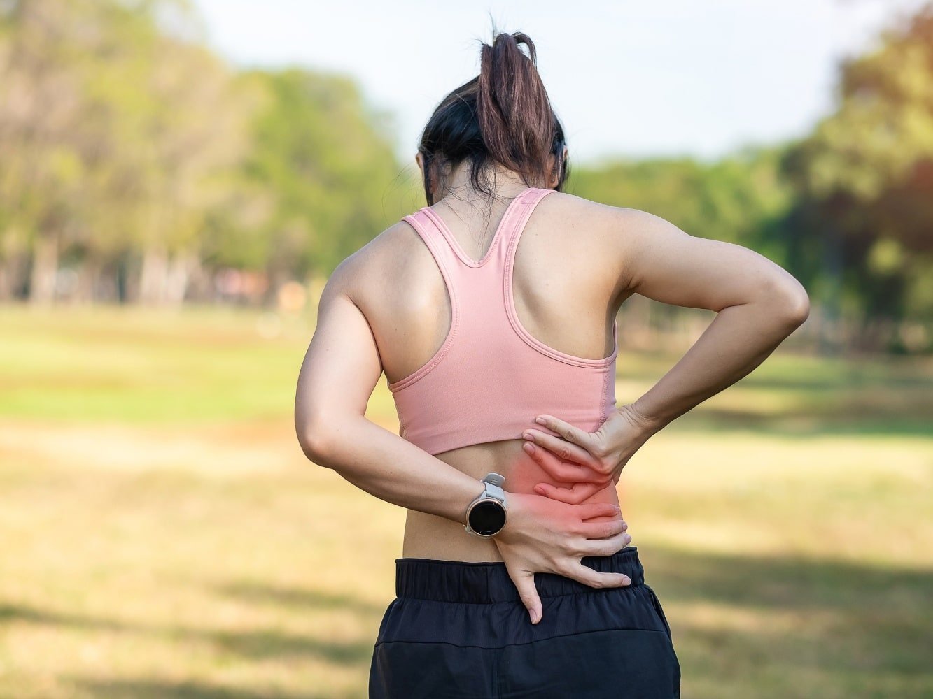 woman with muscle pain after exercise