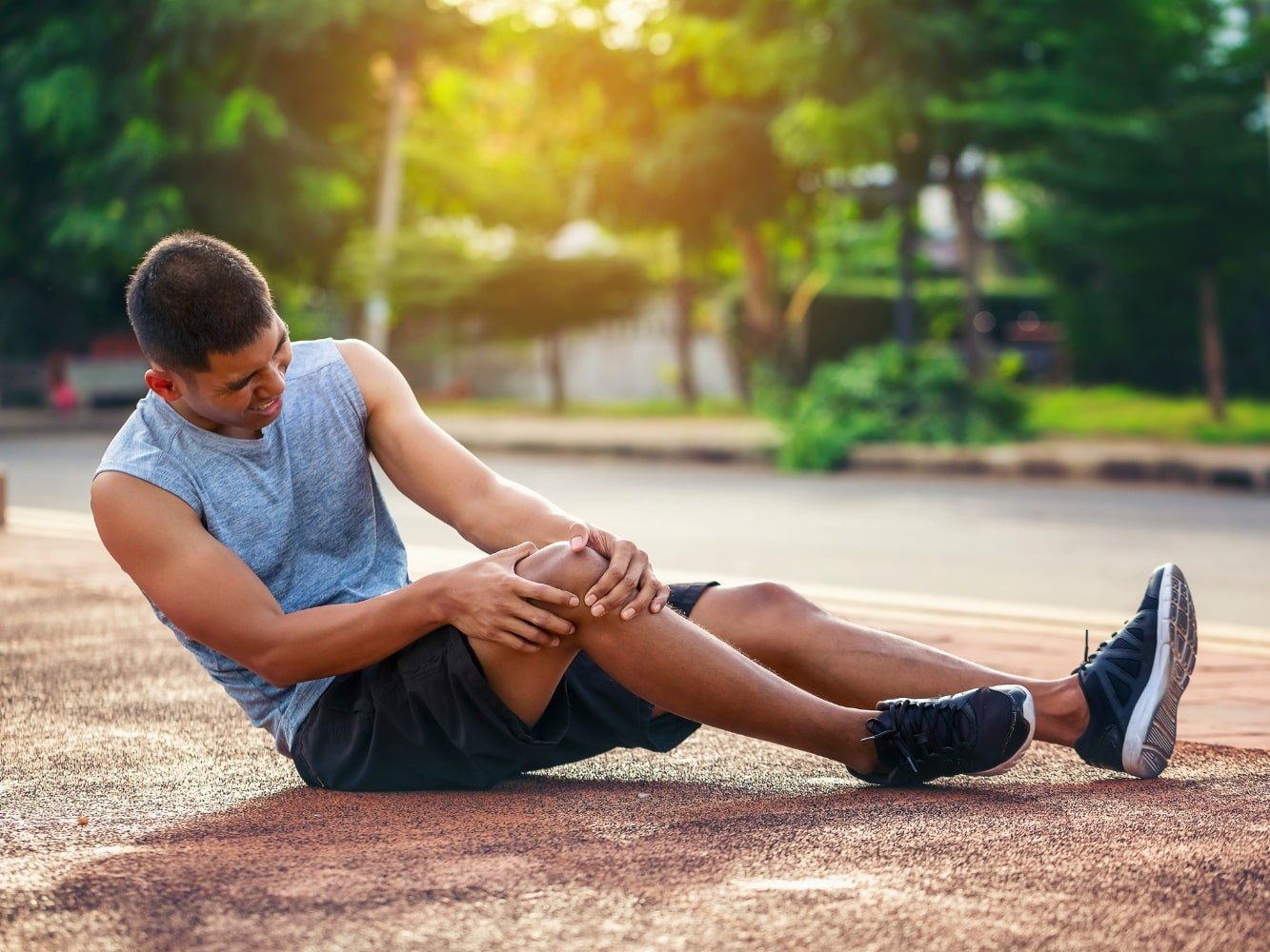 man with muscle pain after sports
