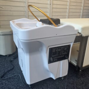 Mobiele Headspa unit met gouden kraan, zijaanzicht